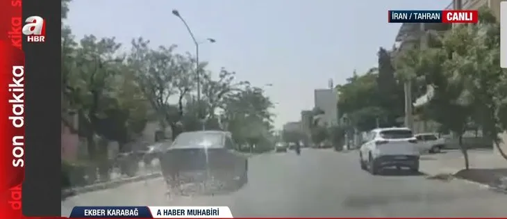 Dünyanın merak ettiği Tahran sokaklarından tek canlı yayın A Haber’de! Üst geçitte dikkat çeken pankart