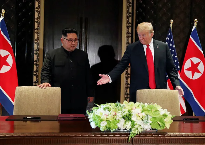 Trump ve Kim'den Singapur'da tarihi imza! Trump'tan flaş açıklamalar... - 1