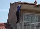 Evin balkonuna cansız manken asıldı