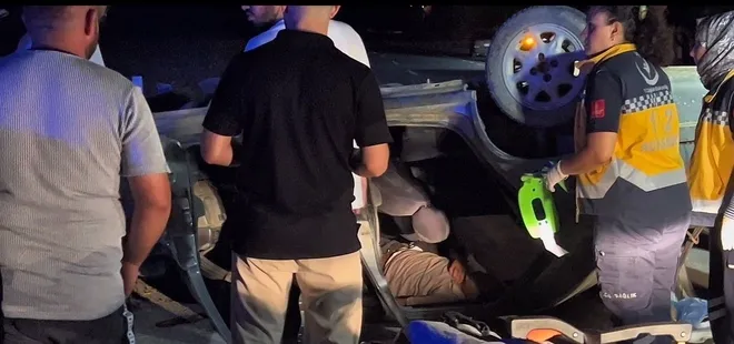 Sakarya’da takla atan otomobilde sıkışan sürücüyü itfaiye kurtardı