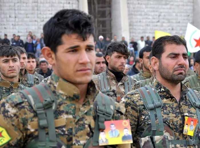 iran-ve-rusya-suriyeden-cekiliyor-sirada-ypgpkk-var-1734334430904.jpg Suriye'de bulunan YPG/PKK terör örgütüne mensup teröristler (Arşiv)