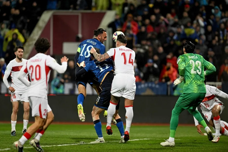 ceyrek-asirlik-hasret-sona-erdi-turkiye-kosovayi-maglup-ederek-dunya-kupasinda-1774990532309.jpg Çeyrek asırlık hasret sona erdi! Türkiye Kosova’yı mağlup ederek Dünya Kupası’nda - 1