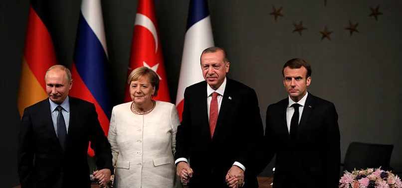 Son dakika: Merkel ve Macron'dan Putin'e ateşkes çağrısı