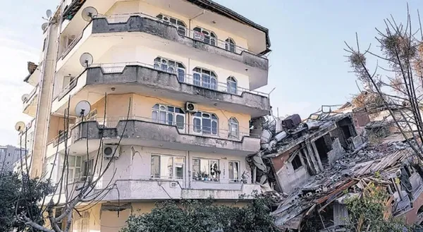 1676704636814.jpeg Üzerine bina yıkılmasına rağmen ayakta! 30 yıllık apartmanda saksı bile kırılmadı! İşte depreme dayanmasının sırrı - 1