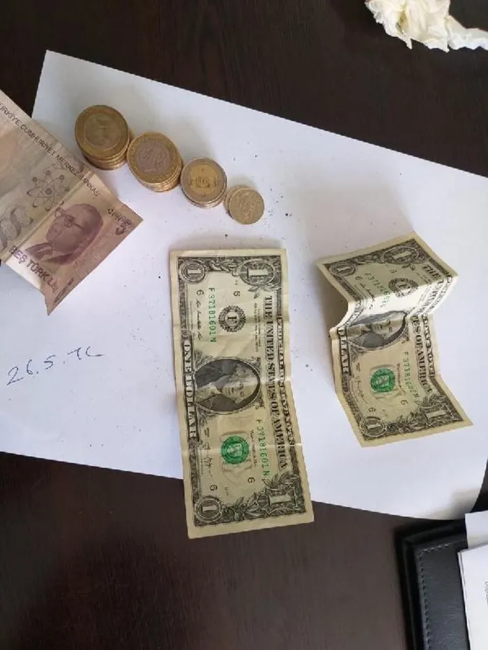 Kadın dilencinin üzerinden 'F' serisi dolar çıktı - 1