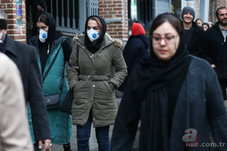 İran’da koronavirüs alarmı! Maskeyle çıktılar...