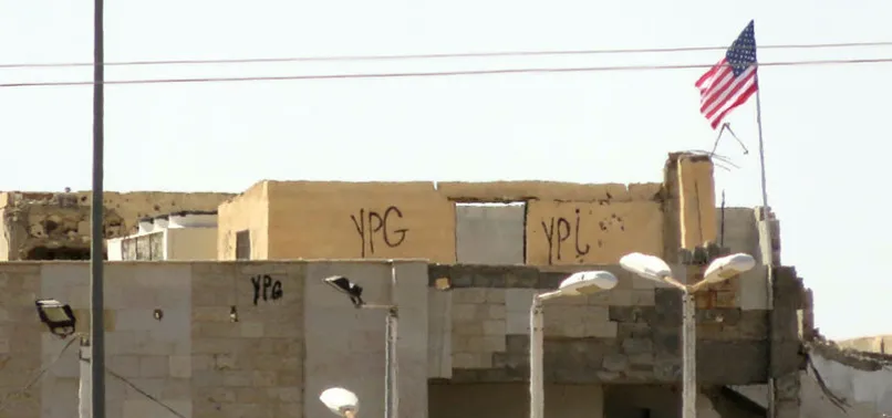 PYD "karargahı"na ikinci ABD bayrağı asıldı