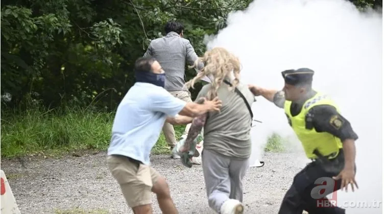 İsveç'te yine Kur'an-ı Kerim yakıldı! Bir kadın yangın söndürücü tüple engel olmaya çalıştı 2