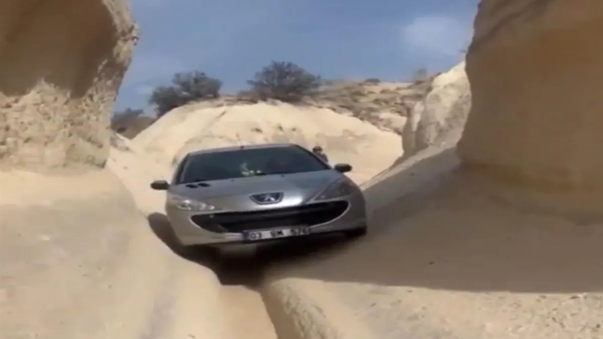 Bunu da kimseye kaptırmadık! Arabayla peribacalarının arasına girdi! Kapadokya'da ilginç anlar