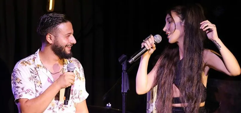 Hande Yener otostop çektiği gençle sahnede şarkı söyledi