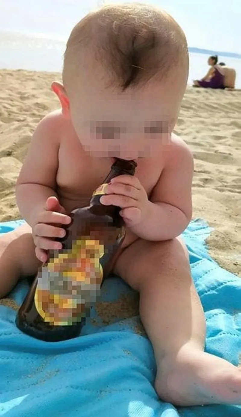 bebegine alkol icirip fotograflari