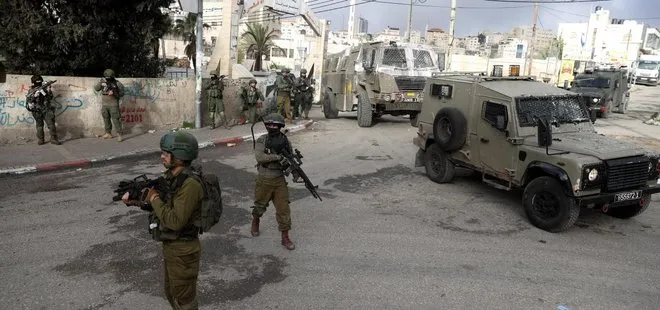 İsrail askerleri, Batı Şeria’daki baskınlarda 22 kişiyi gözaltına aldı