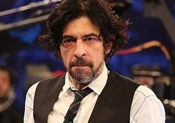 Okan Bayülgen'e üvey babasından miras