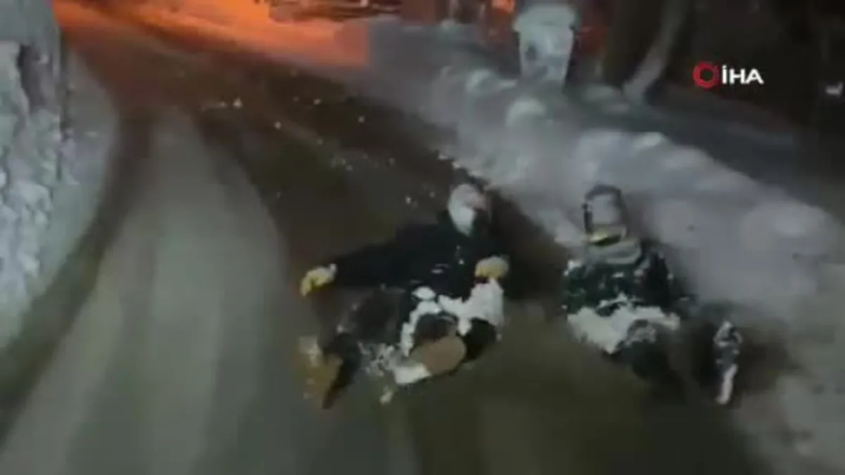 Karda ilginç eğlence: Otomobile ip bağlayıp kaydılar