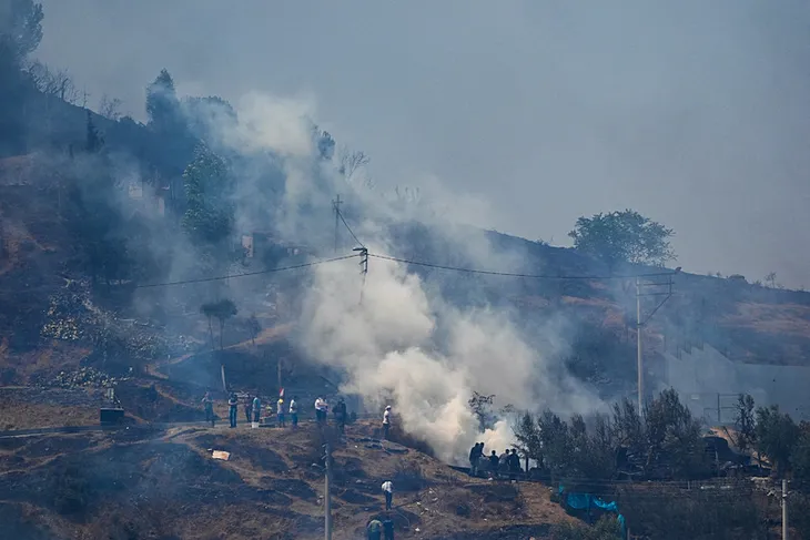 İzmir'de alevler yerleşim yerlerine sıçradı! Bazı evler yandı