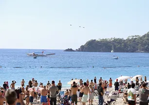 Sahilde heyecanlı anlar! Gören telefona sarıldı