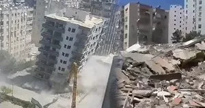 Ağır hasarlı bina yıkım sırasında çöktü