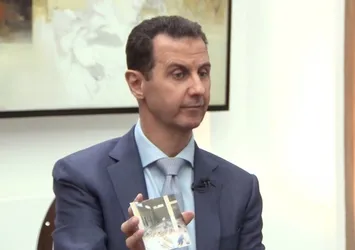 Öldü denilen Esad yüzünü gösterdi