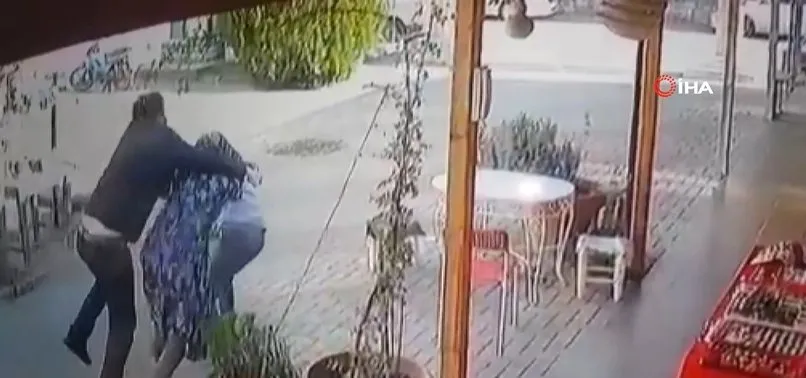 Çocuklarıyla kavga eden kızları darp eden baba güvenlik kamerasına yansıdı