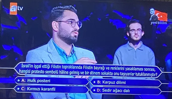 israilin-isgal-ettigi-filistin-topraklarinda-filistin-bayragi-ve-renklerini-yasaklamasi-sonrasi-hangisi-protes-1699215227098.jpg İsrail'in işgal ettiği Filistin topraklarında Filistin bayrağı ve renklerini yasaklaması sonrası hangisi protesto sembolü haline gelmiş ve bir dönem sokakta onu taşıyanlar tutuklanmıştır? - 1