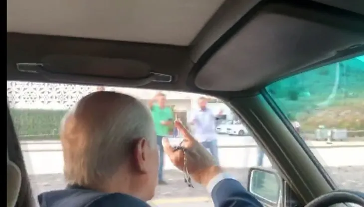 Bahçeli, NeÅet ErtaÅ'ın türküsüyle Ankara'yı gezdi!