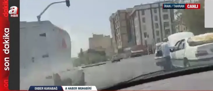 Dünyanın merak ettiği Tahran sokaklarından tek canlı yayın A Haber’de! Üst geçitte dikkat çeken pankart