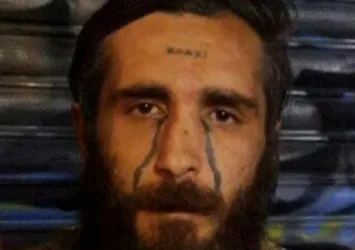 Alnında "enayi" yazan şüpheli serbest bırakıldı