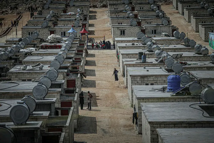 Türk Kızılay’dan İdlib’te çadırda yaşayan Suriyelilere briket ev | Başkan Erdoğan’ın talimatı yerine getirildi
