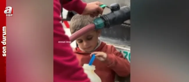 gazzede-filistinli-cocuk-su-damlalariyla-sisesini-doldurdu-1713769044480.jpg
