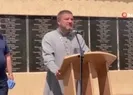 Cenaze töreninde haç ile saldırdı