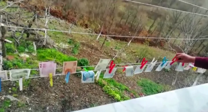1586182484784.jpg Paralarını böyle dezenfekte etti: Önce yıkadı sonra da ipe astı! - 1
