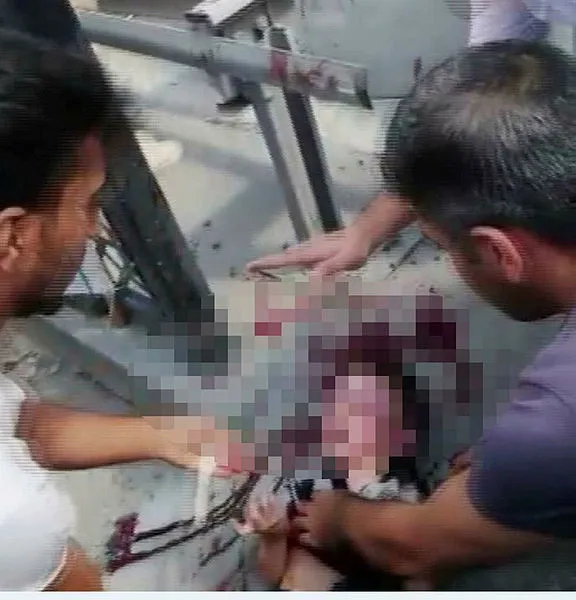 Çocuğunun kafasını demir bariyerlere vuran babaya linç girişimi - 2