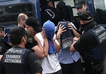 Yunanistan'a kaçan 8 darbeciye 2'şer ay hapis cezası verildi
