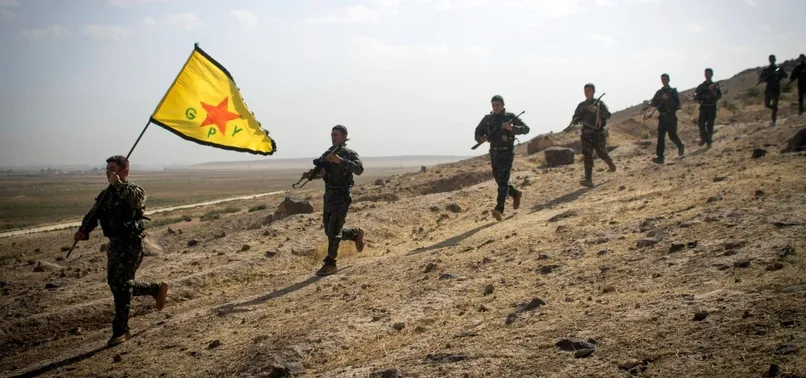ABD YPG'ye silah verme kararını askıya aldı