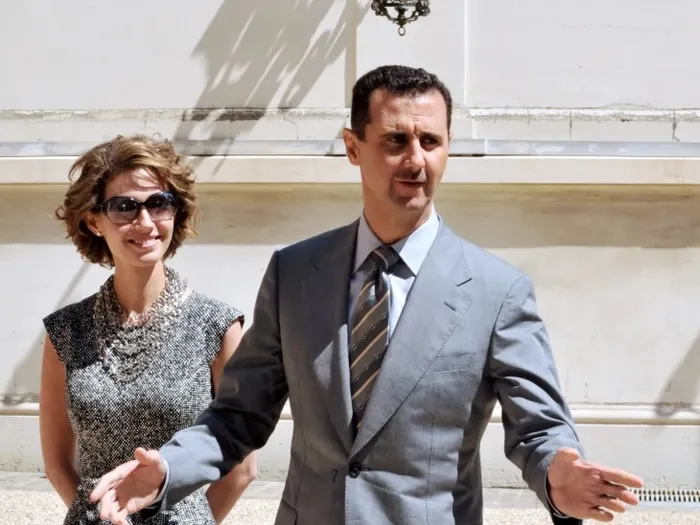 suriyelilerden-caldi-moskovayi-boyle-fonladi-diktator-esad-putine-kul-kole-oldu-1734337179076.jpg Suriye devrik başkanı Beşşar Esad ve eşi Esma Esad (Arşiv)