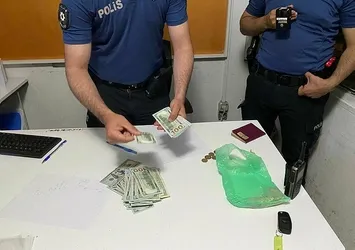 Şüpheli paketten 10 bin 200 dolar çıktı