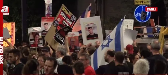israilde-sokaklar-karisti-binlerce-kisi-toplandi-netanyahuya-tepkiler-dinmiyor-a-haber-ekibi-tel-aviv-sokaklar-1717452596907.jpg İsrail'de sokaklar karıştı! Binlerce kişi toplandı Netanyahu'ya tepkiler dinmiyor: A haber ekibi Tel Aviv sokaklarında - 2