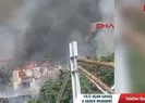 Ağaçlık alanda çıkan yangın evlere sıçradı
