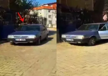 Evinin girişine çekilen araca sopayla saldırdı