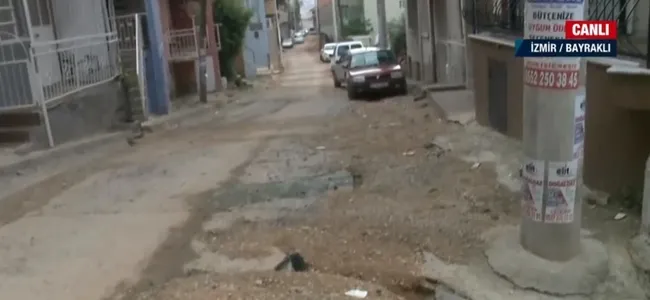 İzmir'de altyapı isyanı! Aşırı yağış sonrası köstebek yuvasına dönen yol çöktü - 3