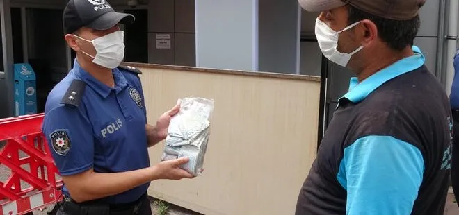 Temizlik işçisi bulduğu para dolu poşeti polise teslim etti
